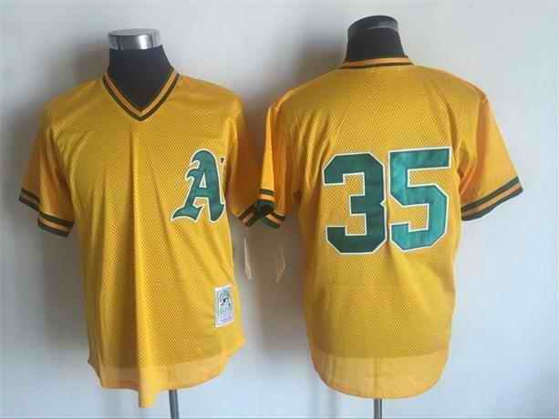 Men's Oakland Athletics #35 Rickey Henderson Mitchell And Ness Yellow 1984 Throwback Stitched MLB Jersey